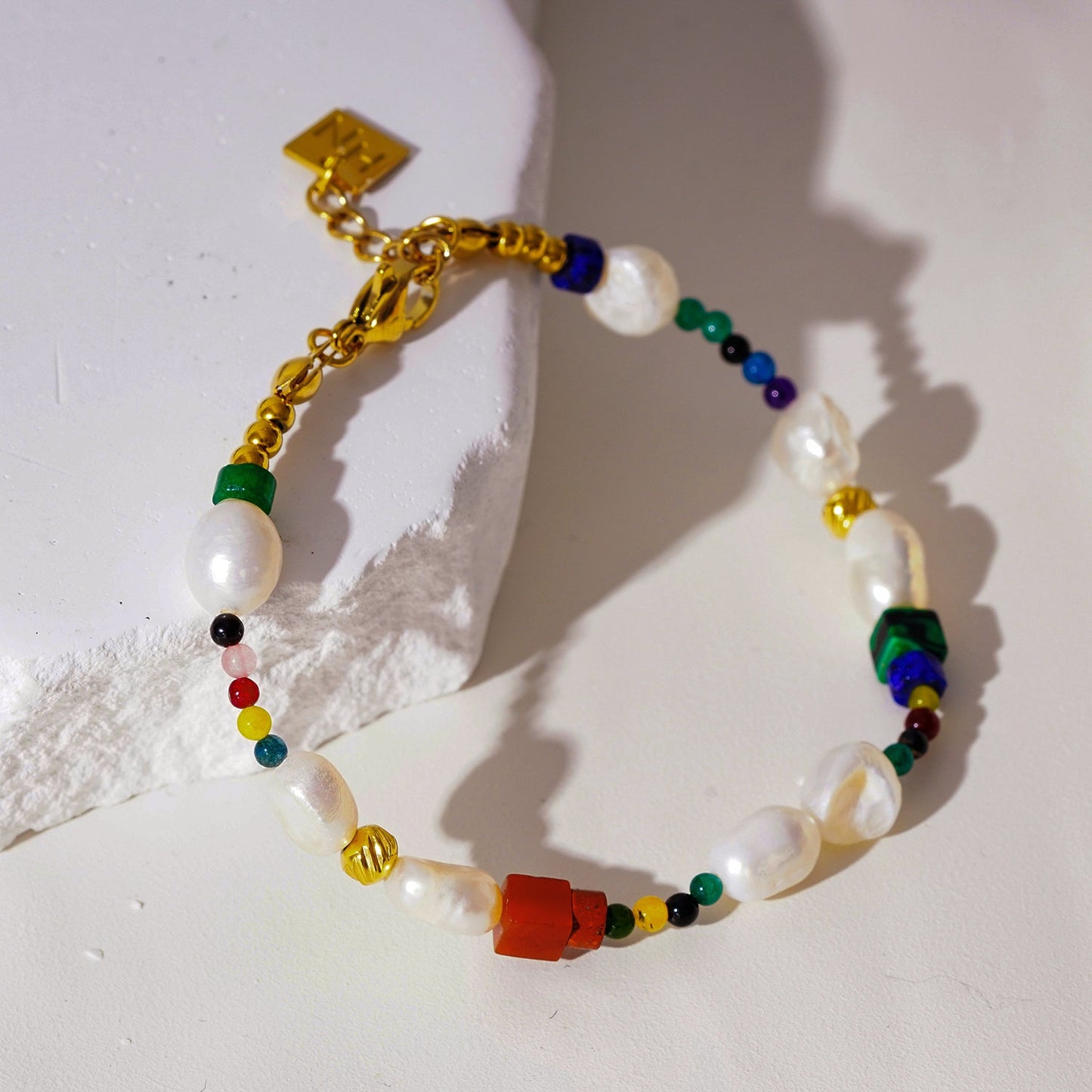 Colourful Bracelet with Gold Beads, Natural Stones, and Freshwater Pearls
