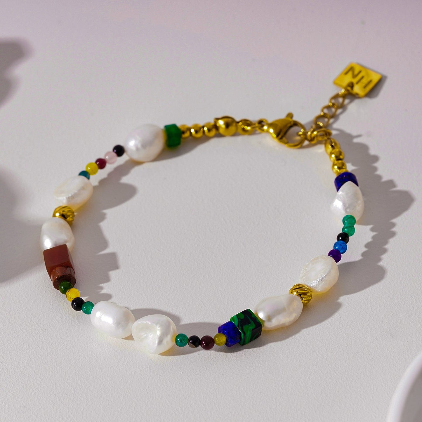 Colourful Bracelet with Gold Beads, Natural Stones, and Freshwater Pearls